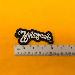 Embroidered Whitesnake patch dimensions beside ruler