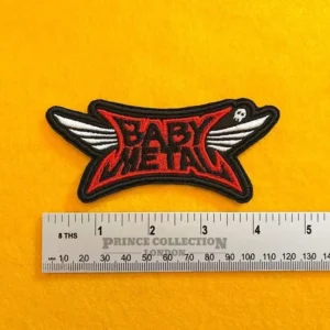 Embroidered BABYMETAL design beside measurement ruler