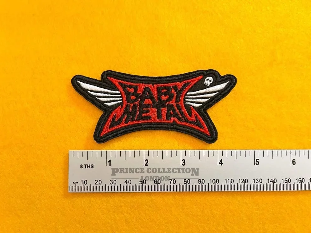 Embroidered BABYMETAL design beside measurement ruler