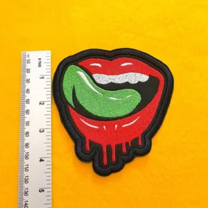 Close-up of embroidered border and stitching