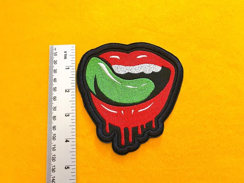 Close-up of embroidered border and stitching