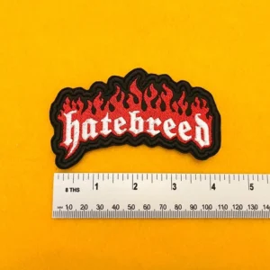 Embroidered Hatebreed design beside measurement ruler
