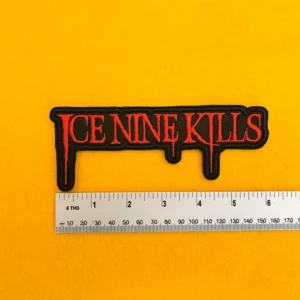 Embroidered Ice Nine Kills design beside measurement ruler