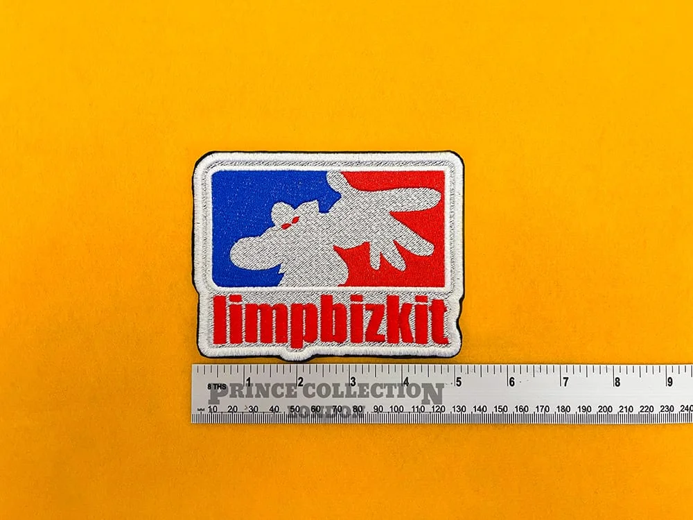 Embroidered Limp Bizkit design beside measurement ruler