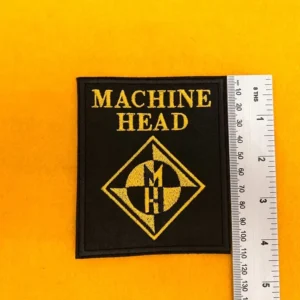 Machine Head embroidered band patch beside measurement ruler