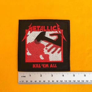 Embroidered Kill 'Em All design beside measurement ruler