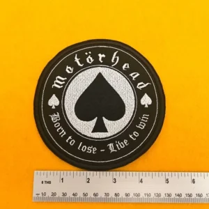 Motörhead embroidered band patch beside measurement ruler