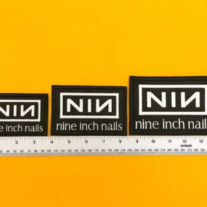 Nine Inch Nails embroidered band patch on denim jacket