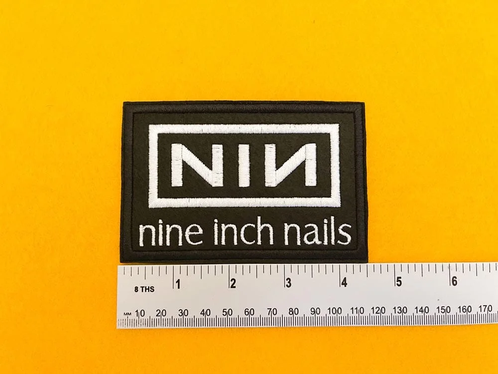 Small medium and large Nine Inch Nails patch size comparison