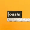 Oasis white on black patch dimensions