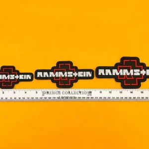Embroidered Rammstein design beside measurement ruler