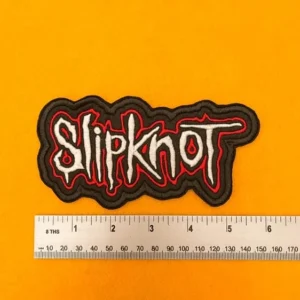 Embroidered Slipknot logo beside measurement ruler